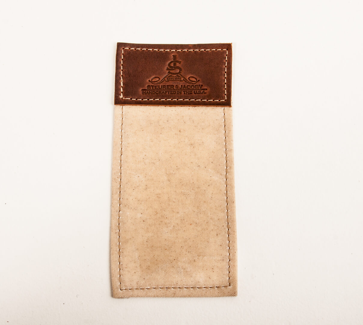 Natural waxed with chestnut leather