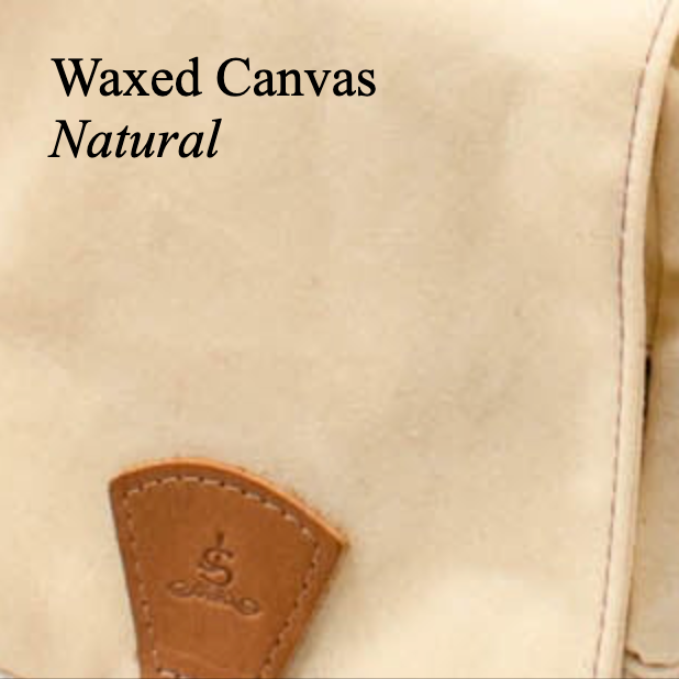 Waxed canvas bag with leather patch and brand logo, labeled 'Waxed Canvas Natural'.